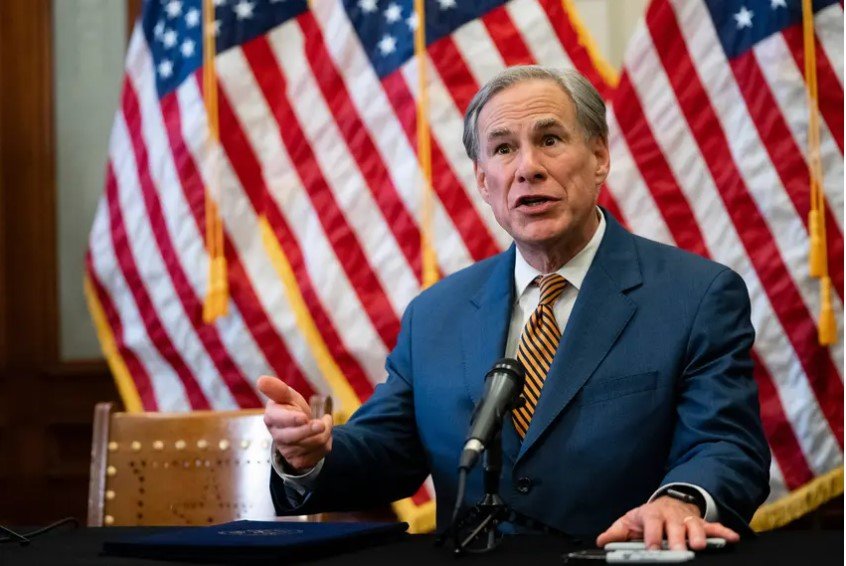 Gov. Greg Abbott signs Senate Bill 2 and Senate Bill 3 at the Texas Capitol on June 8, 2022. The omnibus power grid bills will change the state’s power grid and the people who oversee it.